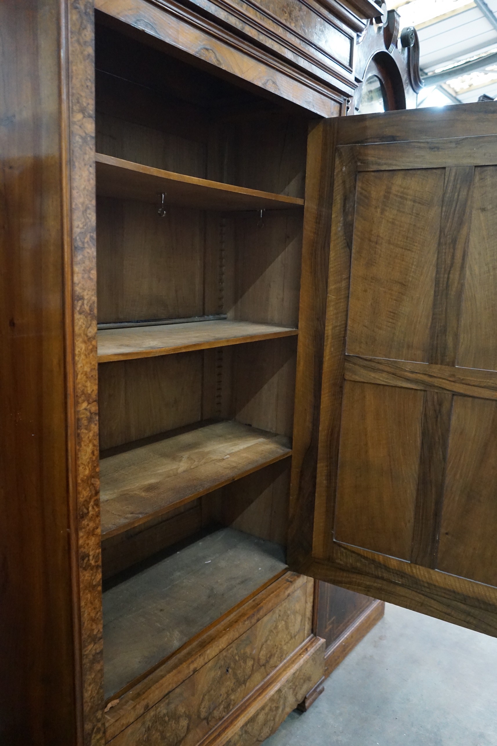 A 19th century French burr walnut mirrored armoire, width 116cm, depth 54cm, height 224cm